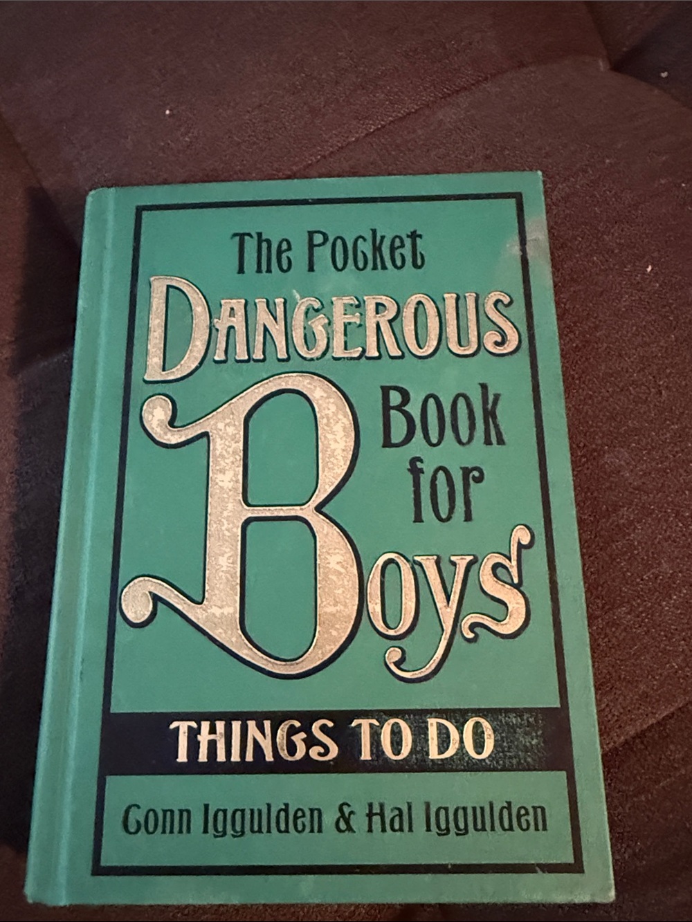 The pocket Dangerous Book for Boys hardcover book